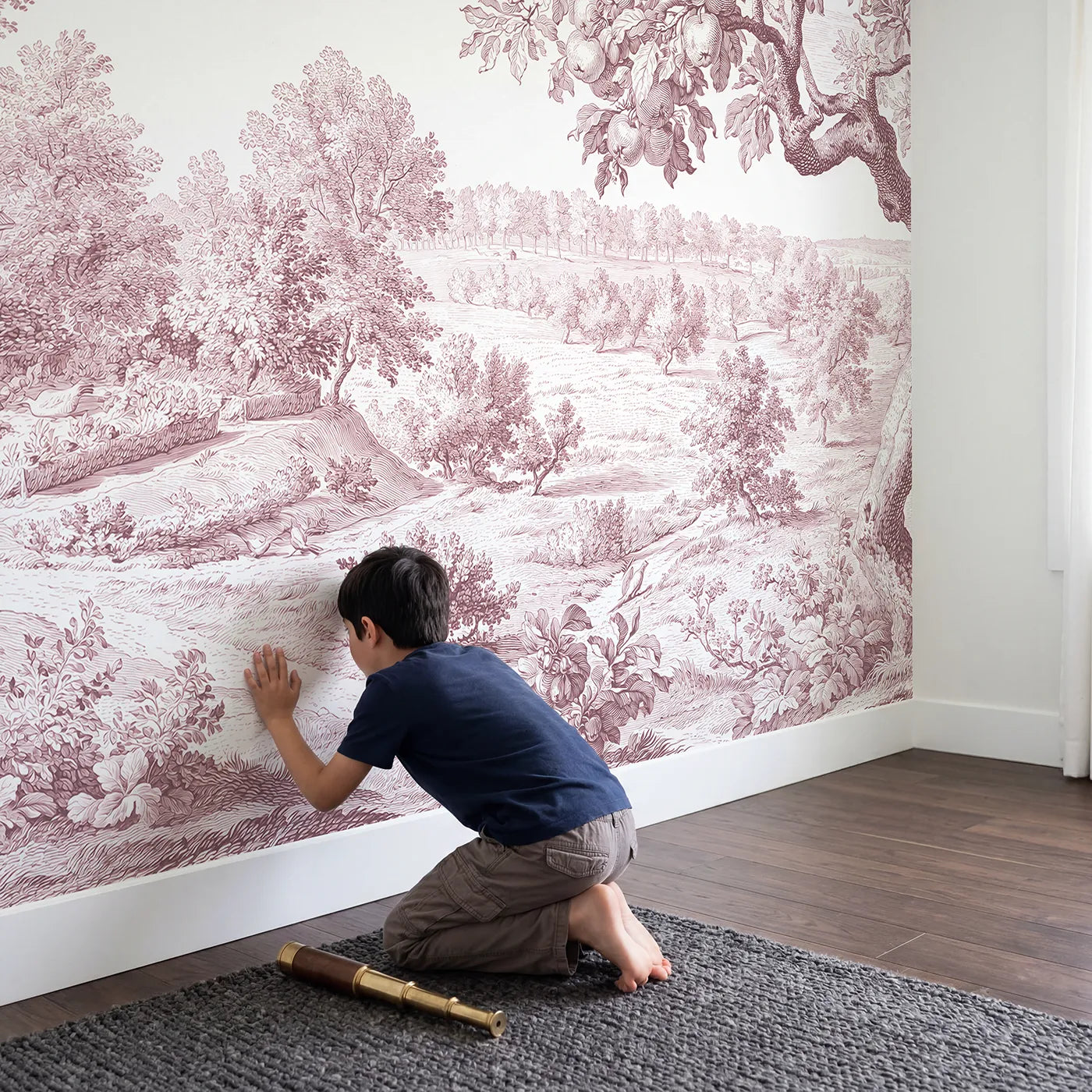 Child in nursery with Dovecote Garden Corner Wallpaper Mural in Pink by Whimsy Tots