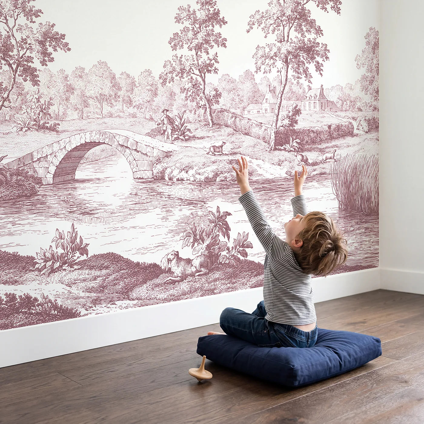 Child in nursery with Stone Arch Bridge Wallpaper Mural in Pink by Whimsy Tots