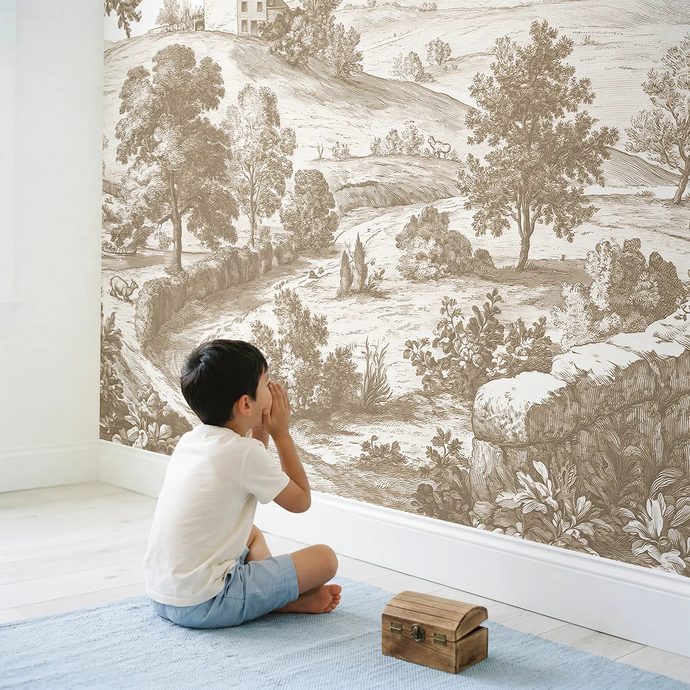 Child in nursery with Hilltop Cottage View Wallpaper Mural in Brown by Whimsy Tots