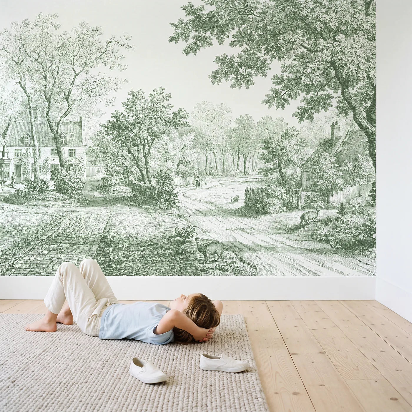 Child in nursery with Cobblestone Village Square Wallpaper Mural in Green by Whimsy Tots
