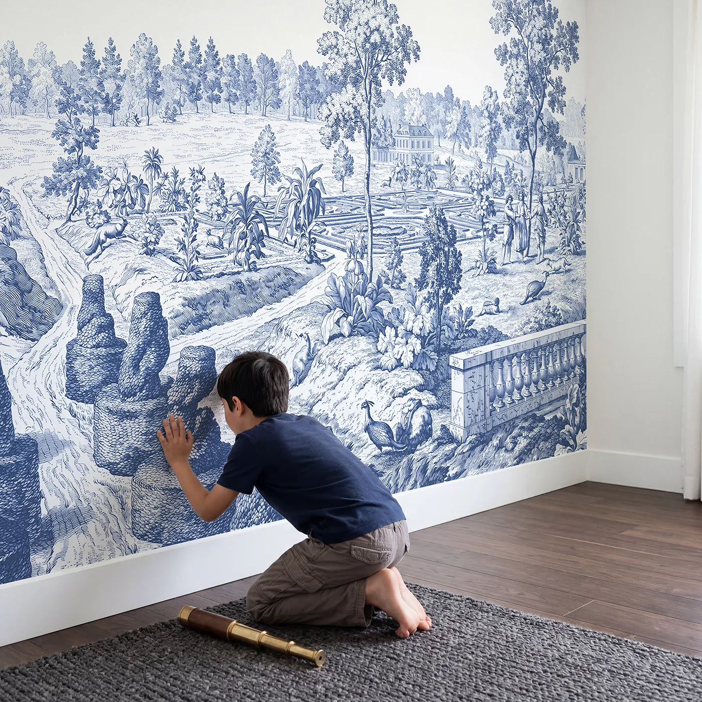 Child in nursery with Topiary Garden Path Wallpaper Mural by Whimsy Tots