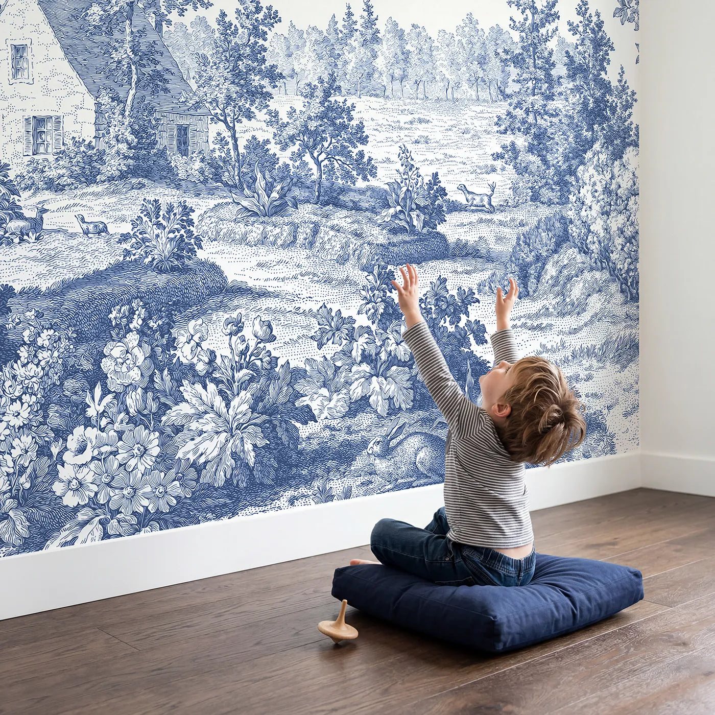 Child in nursery with Snug Cottage Garden Wallpaper Mural by Whimsy Tots