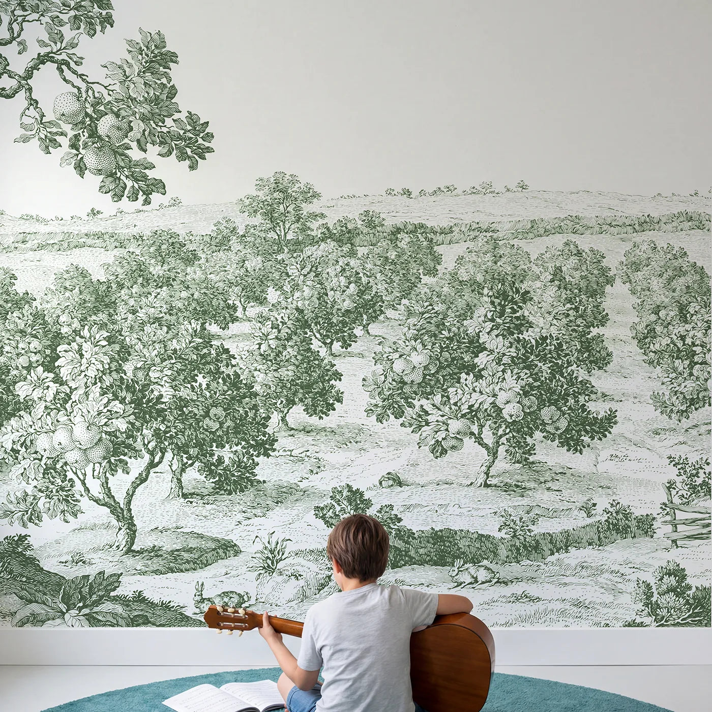 Child in nursery with Apple Orchard Rows Wallpaper Mural in Green by Whimsy Tots