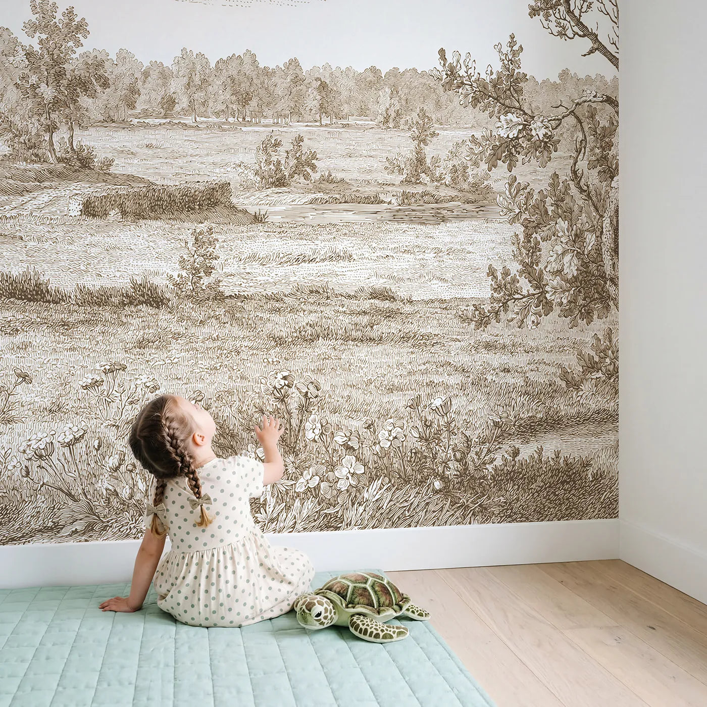 Child in nursery with Wildflower Field Drift Wallpaper Mural in Brown by Whimsy Tots