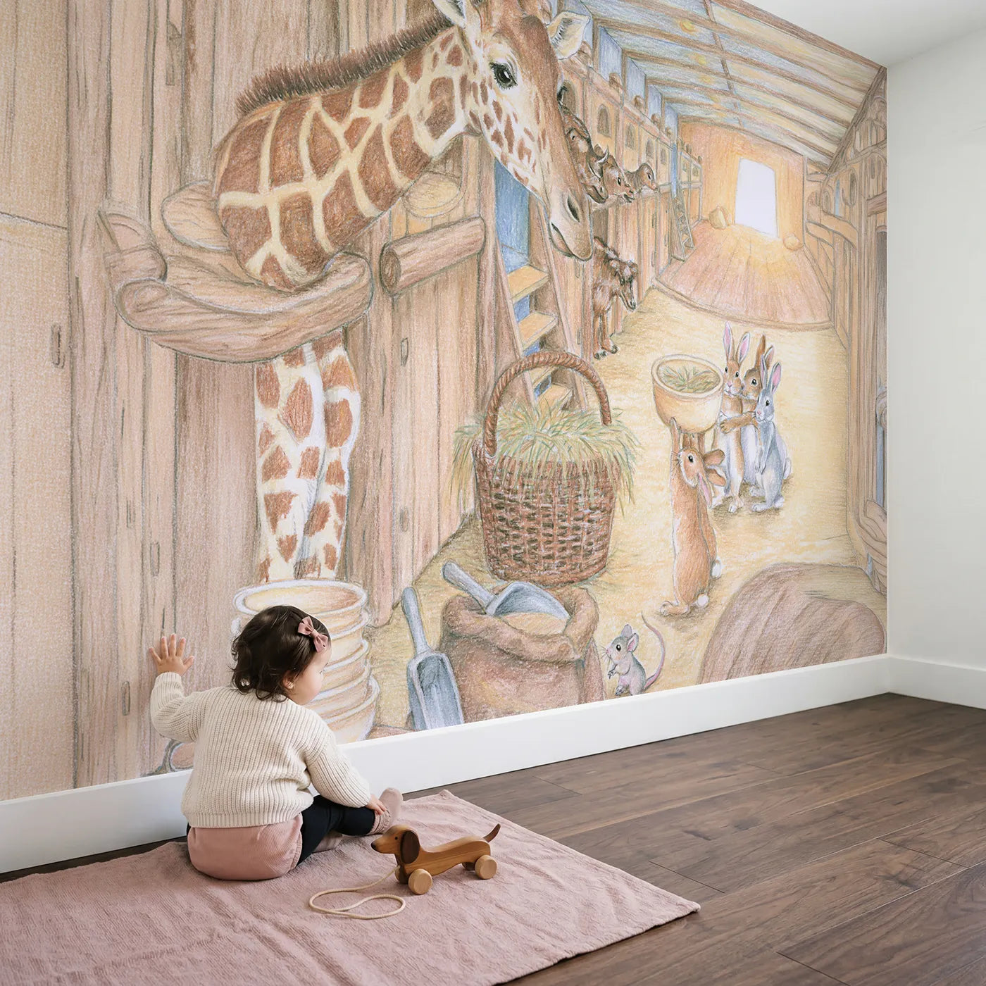 Child in nursery with Feeding Time on the Ark Wallpaper Mural by Whimsy Tots