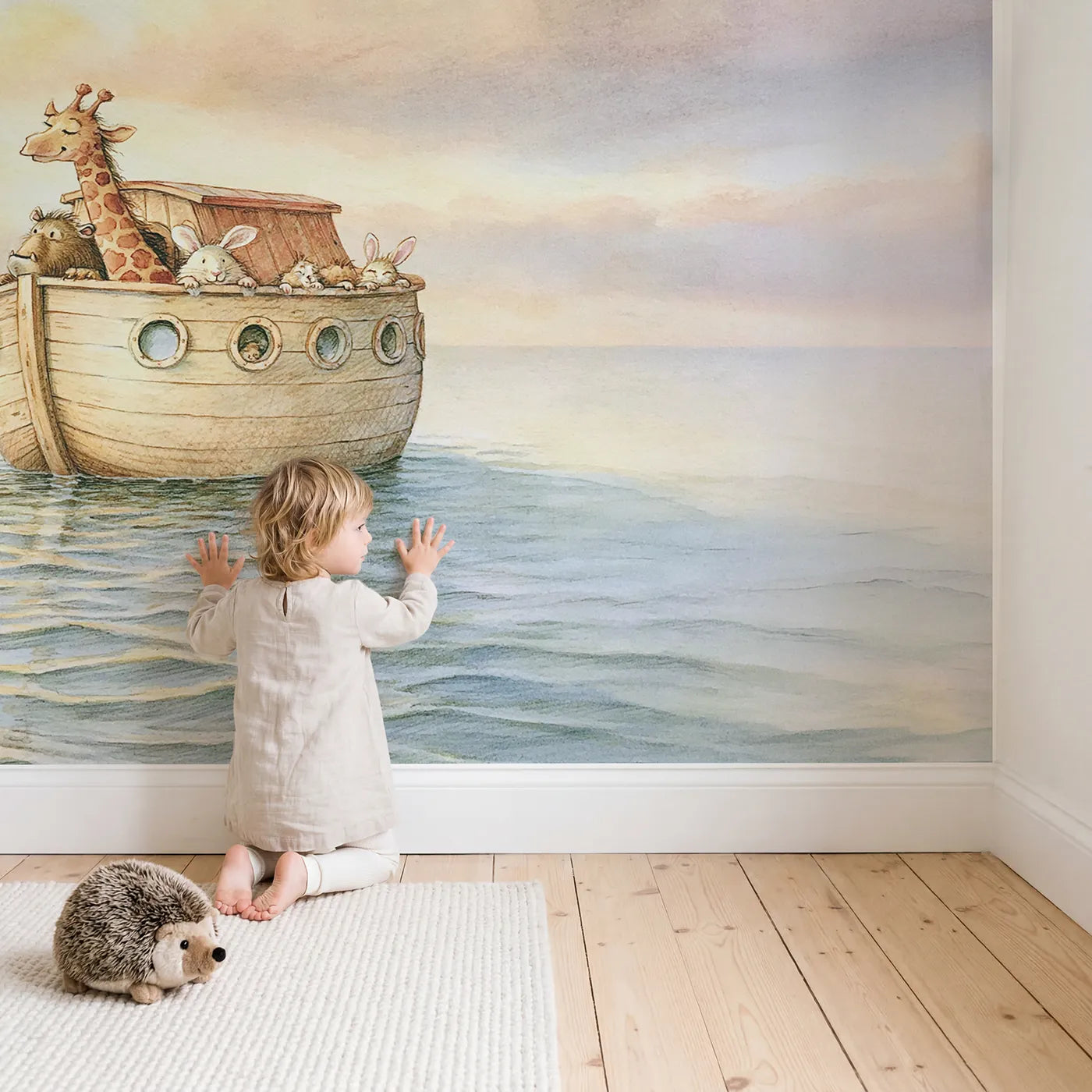 Child in nursery with Gentle Ark Voyage Wallpaper Mural by Whimsy Tots