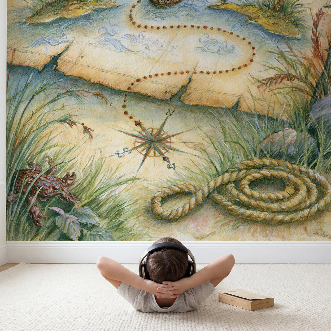 Child in nursery with Pirate Voyage Map Wallpaper Mural by Whimsy Tots