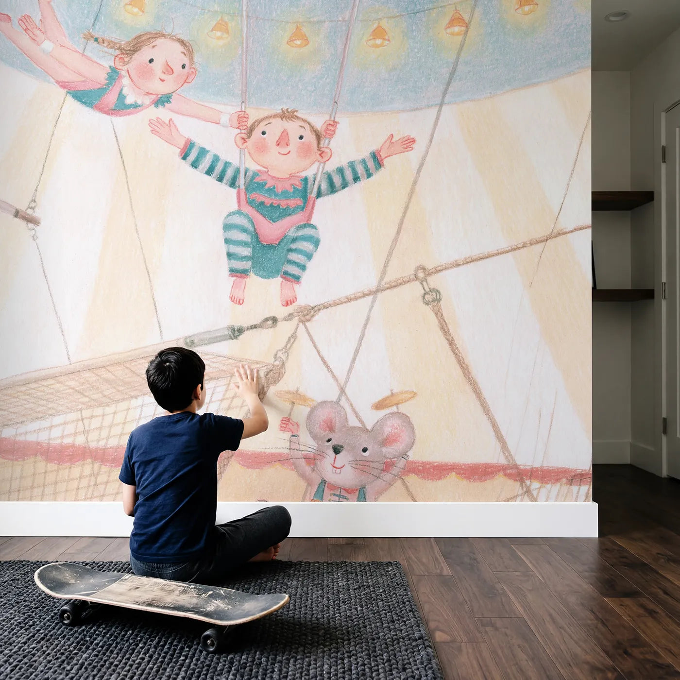 Child in nursery with The Trapeze Catch Wallpaper Mural by Whimsy Tots