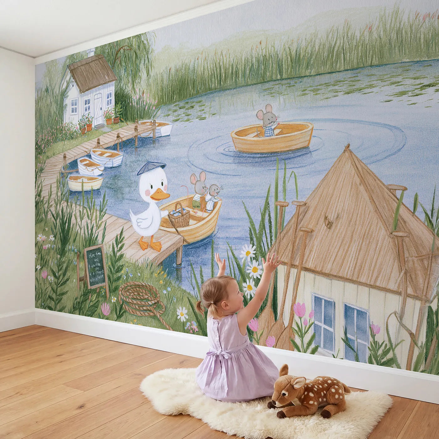 Child in nursery with The Boat Hire Jetty Wallpaper Mural by Whimsy Tots