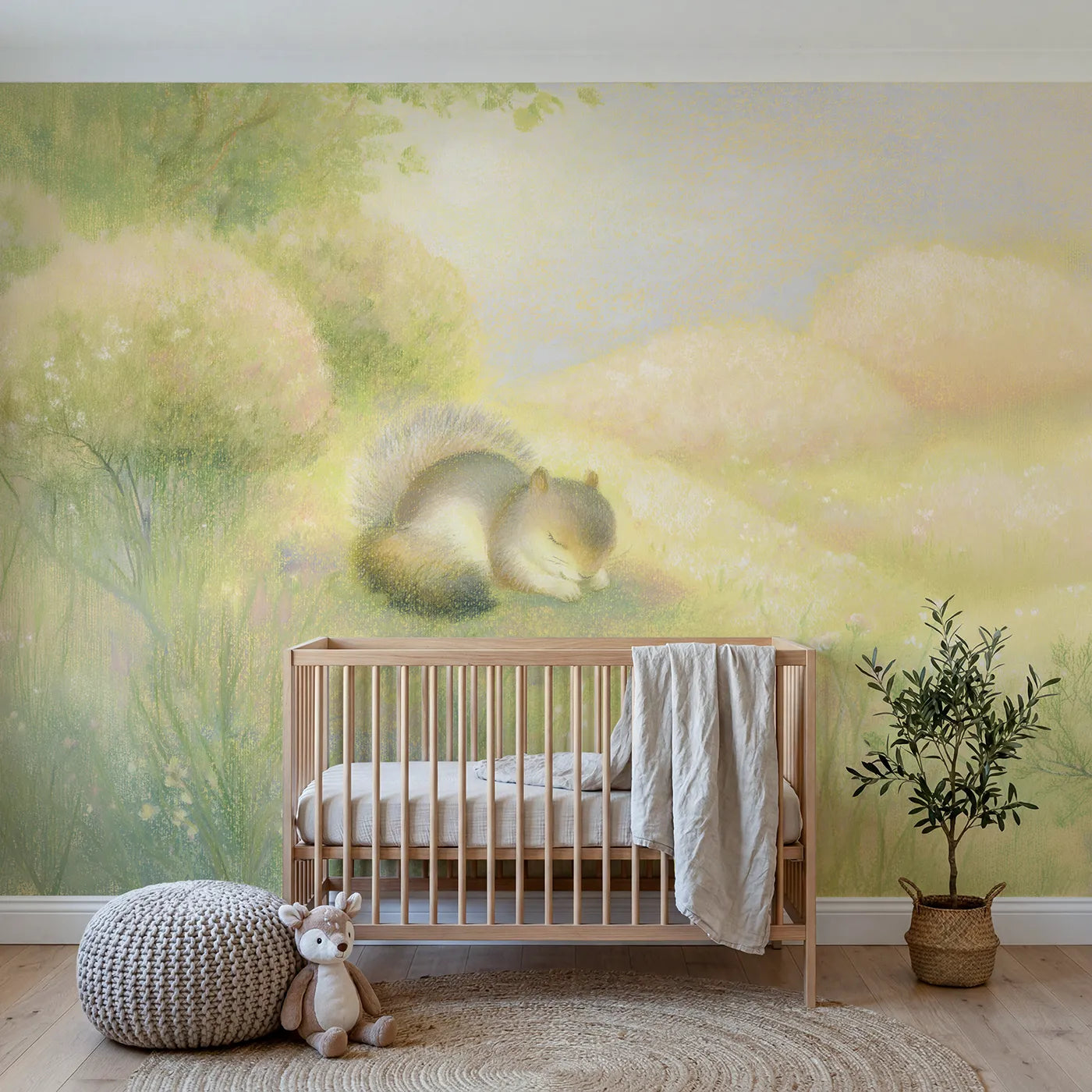 Chalk pastel wall mural of a squirrel asleep under its tail on blush by Whimsy Tots