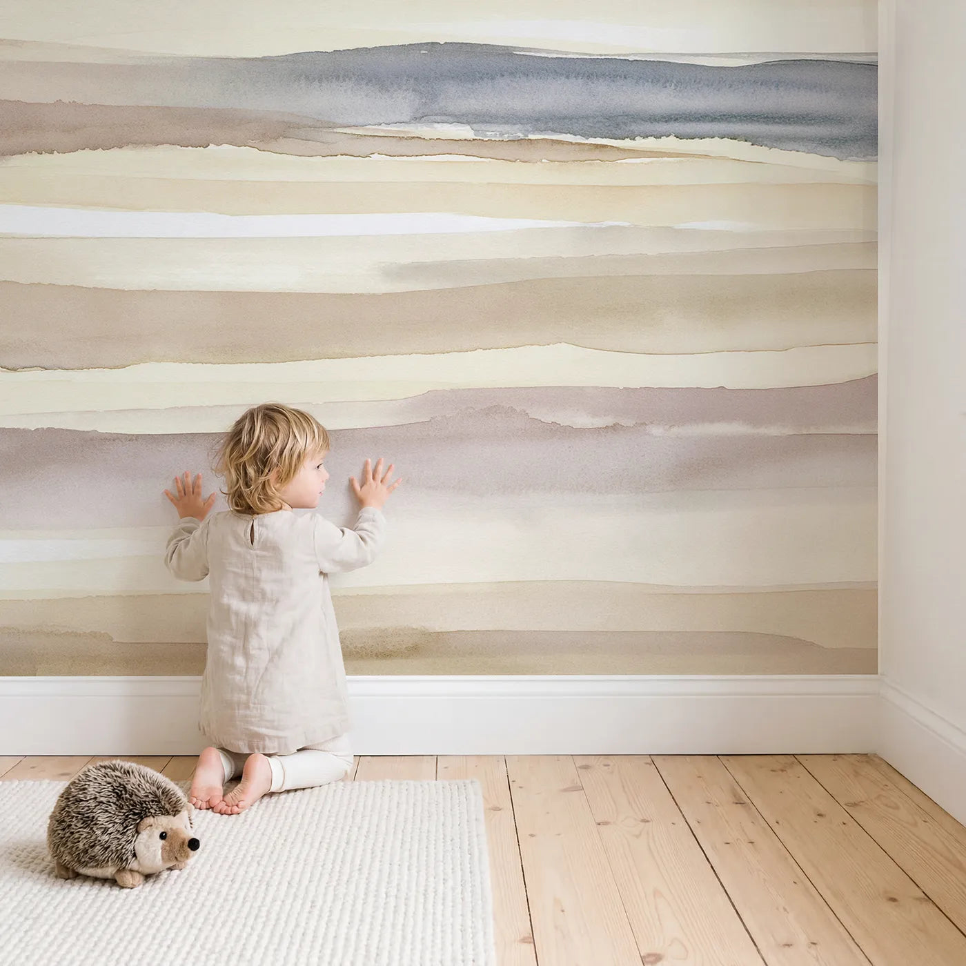 Child in nursery with Hushed Horizon Wallpaper Mural by Whimsy Tots