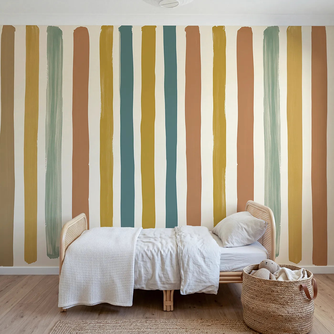 Gouache wall mural of hand-painted stripes on warm cream by Whimsy Tots