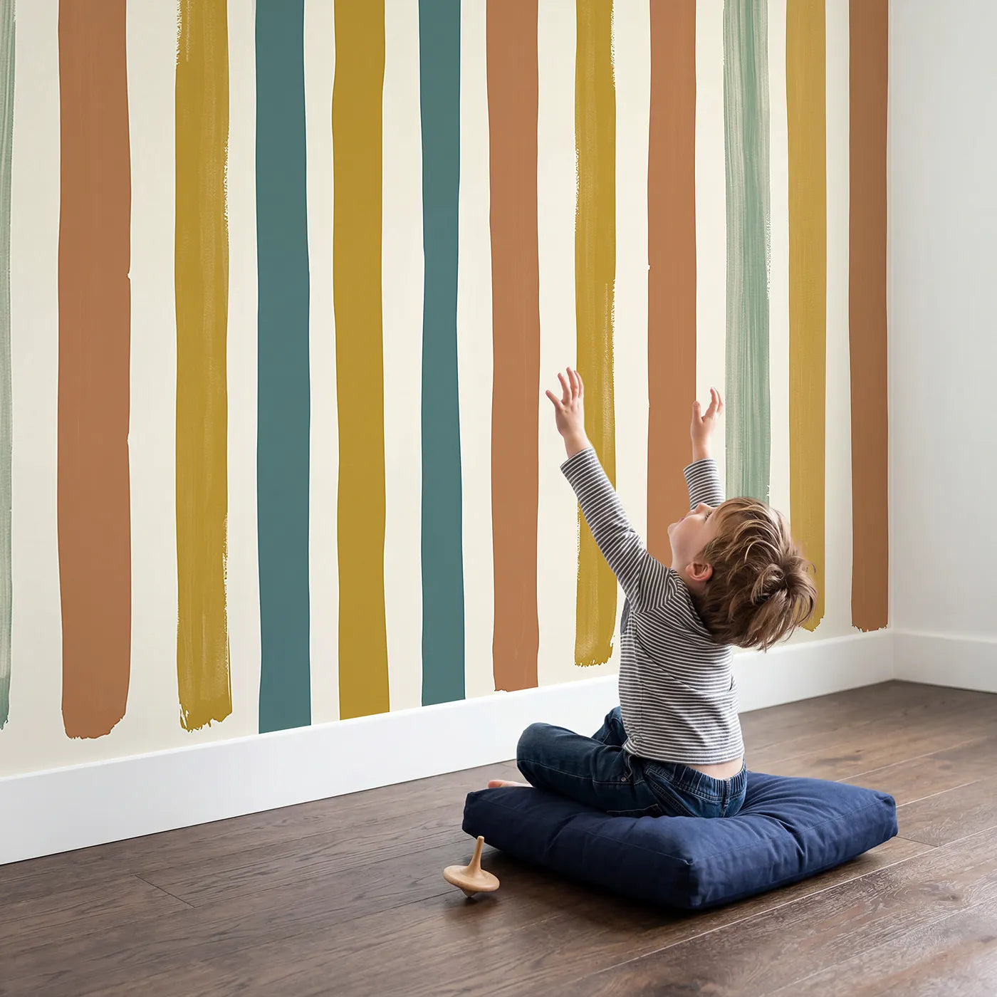Child in nursery with Painted Stripe Wallpaper Mural by Whimsy Tots