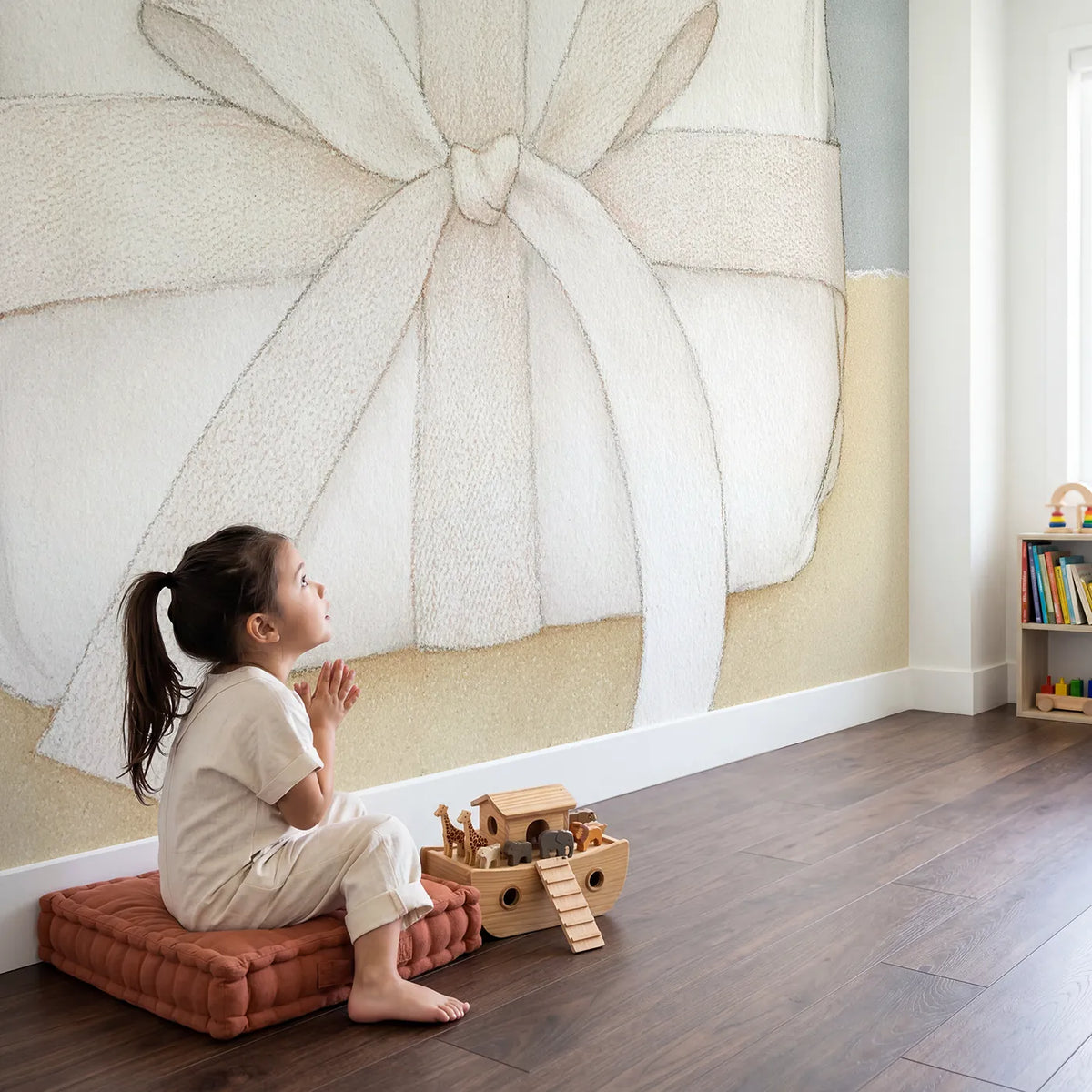 Child in nursery with The Wrapped Ribbon Wallpaper Mural by Whimsy Tots