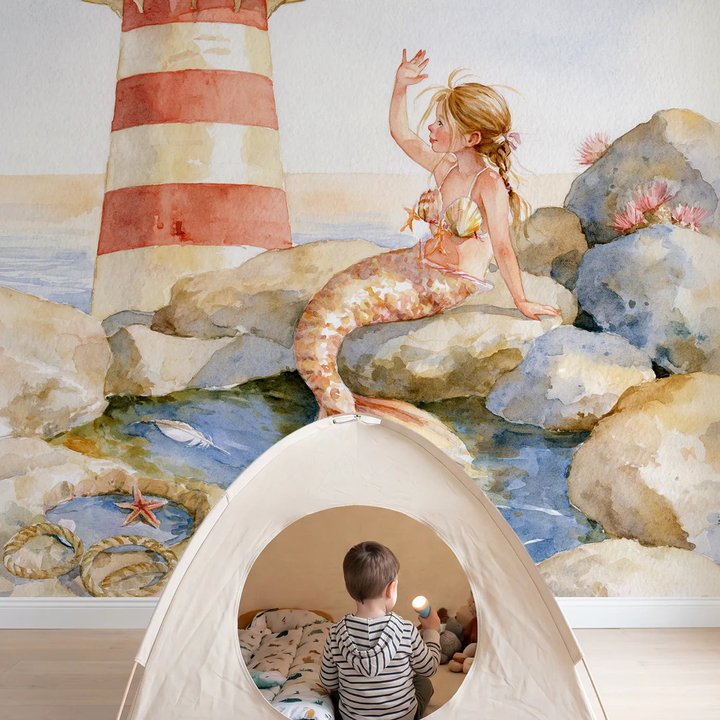 Child in nursery with Mermaid Lighthouse Visit Wallpaper Mural by Whimsy Tots