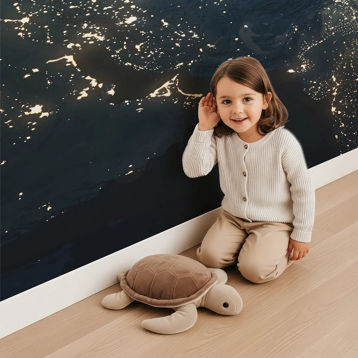 Child in front of Whimsy Tots Earth at Night Wall Mural with earth, space, planet, night, light, world, orbit, science in design.