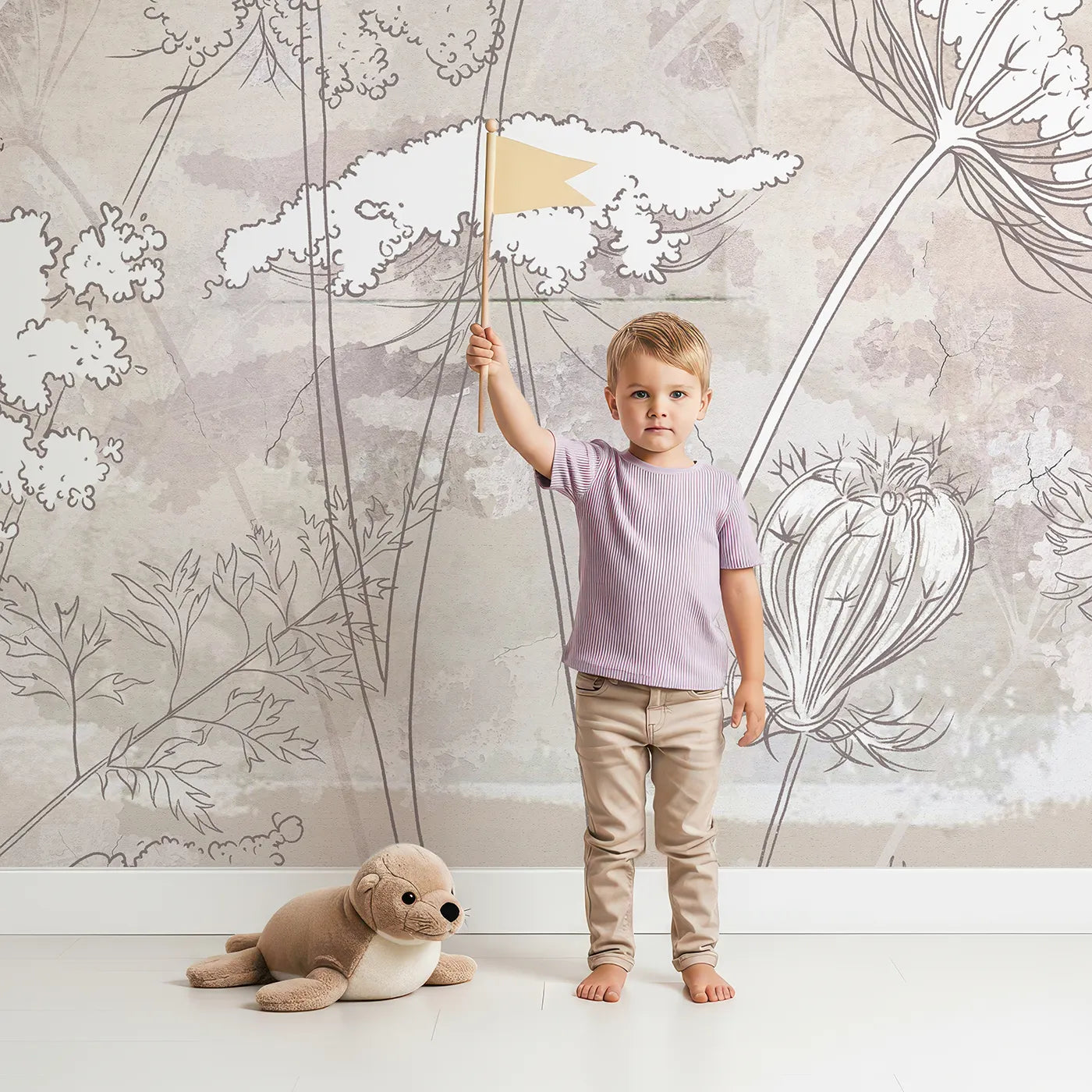 Child in front of Whimsy Tots Wildflower Sketch Wall Mural in Beige with flower, wildflower, sketch, line art, botanical, beige, boho, rustic in design.