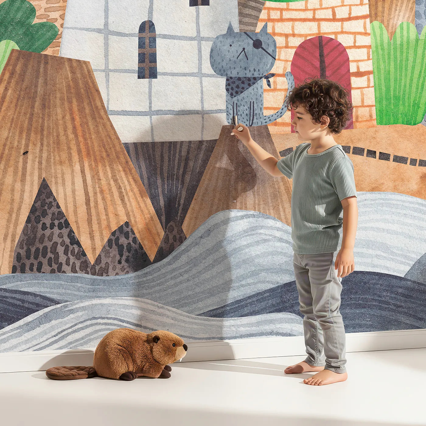 Child in front of Whimsy Tots Treasure Island Adventure Wall Mural with pirate, treasure, island, map, animal, dinosaur, ship, adventure in design.