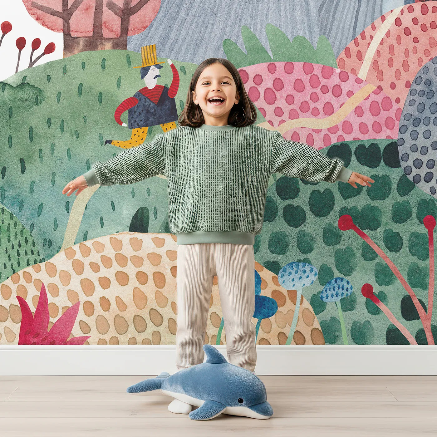 Child in front of Whimsy Tots Nightfall Kingdom Wall Mural with castle, king, night, moon, star, fantasy, watercolor, landscape in design.