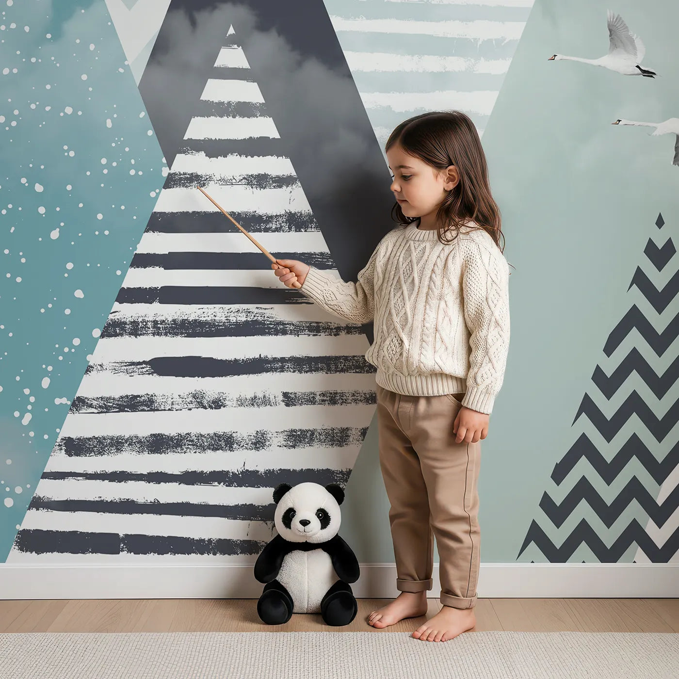 Child in front of Whimsy Tots Geometric Mountain Air Show Wall Mural with mountain, geometric, balloon, swan, modern, teal, gray, abstract in design.