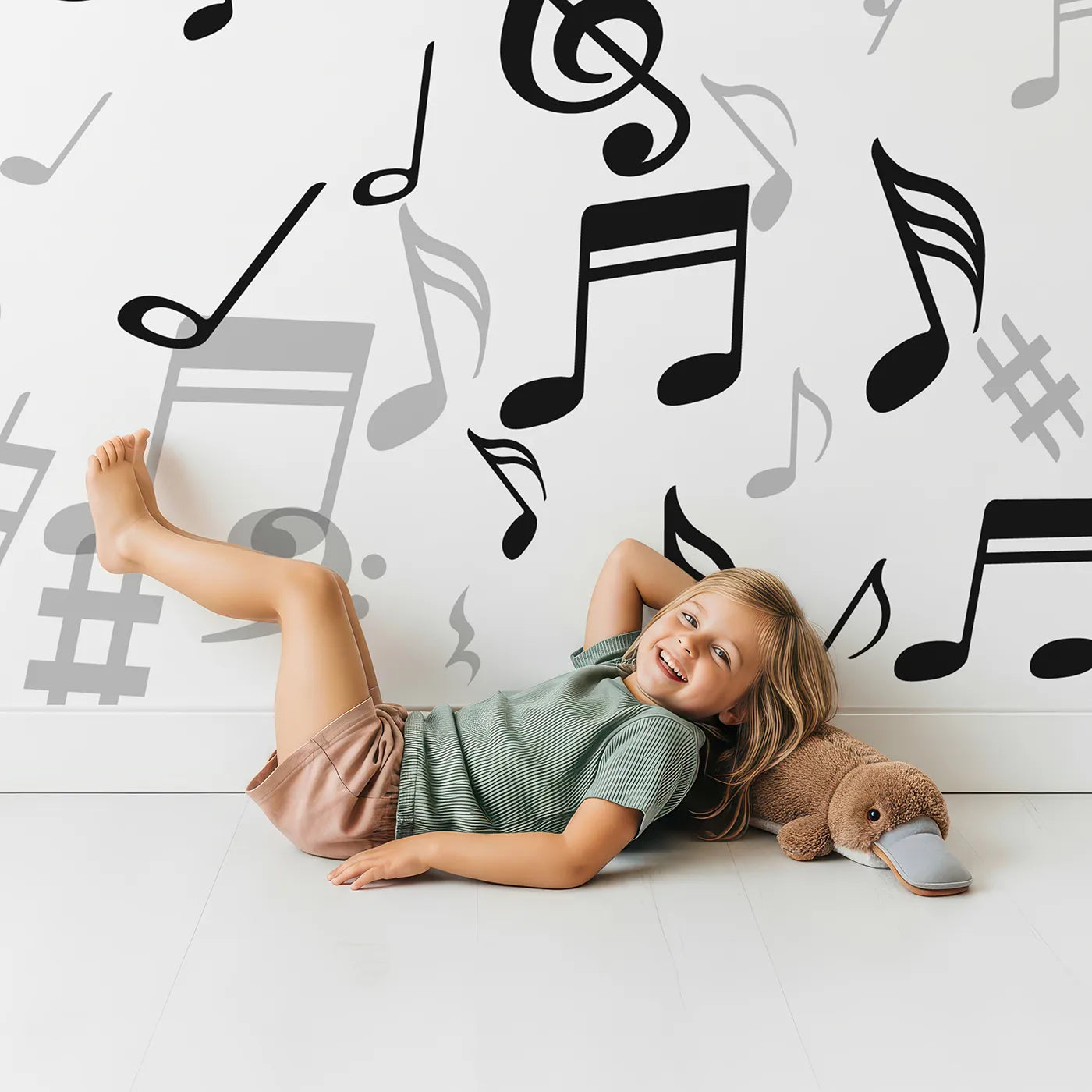 Child in front of Whimsy Tots Monochrome Melody Wall Mural with music, note, black and white, monochrome, melody, clef, modern, simple in design.