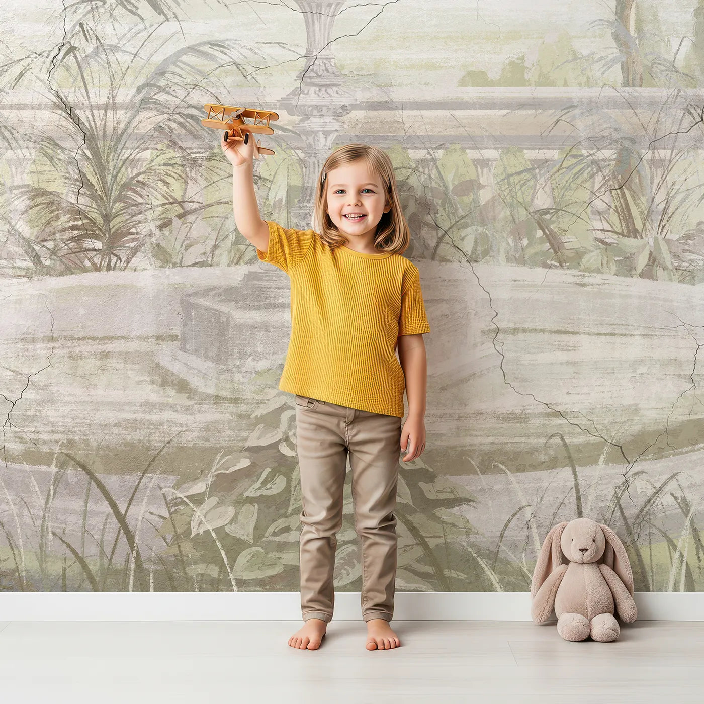 Child in front of Whimsy Tots Forgotten Garden Fountain Wall Mural with garden, fountain, vintage, secret garden, overgrown, romantic, italy, rustic in design.