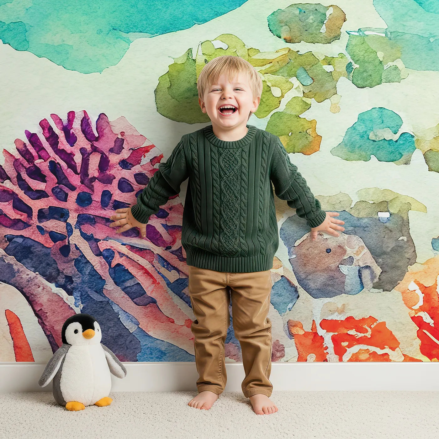 Child in front of Whimsy Tots Abstract Coral Reef Wall Mural with coral, reef, ocean, sea, abstract, watercolor, vibrant, blue in design.