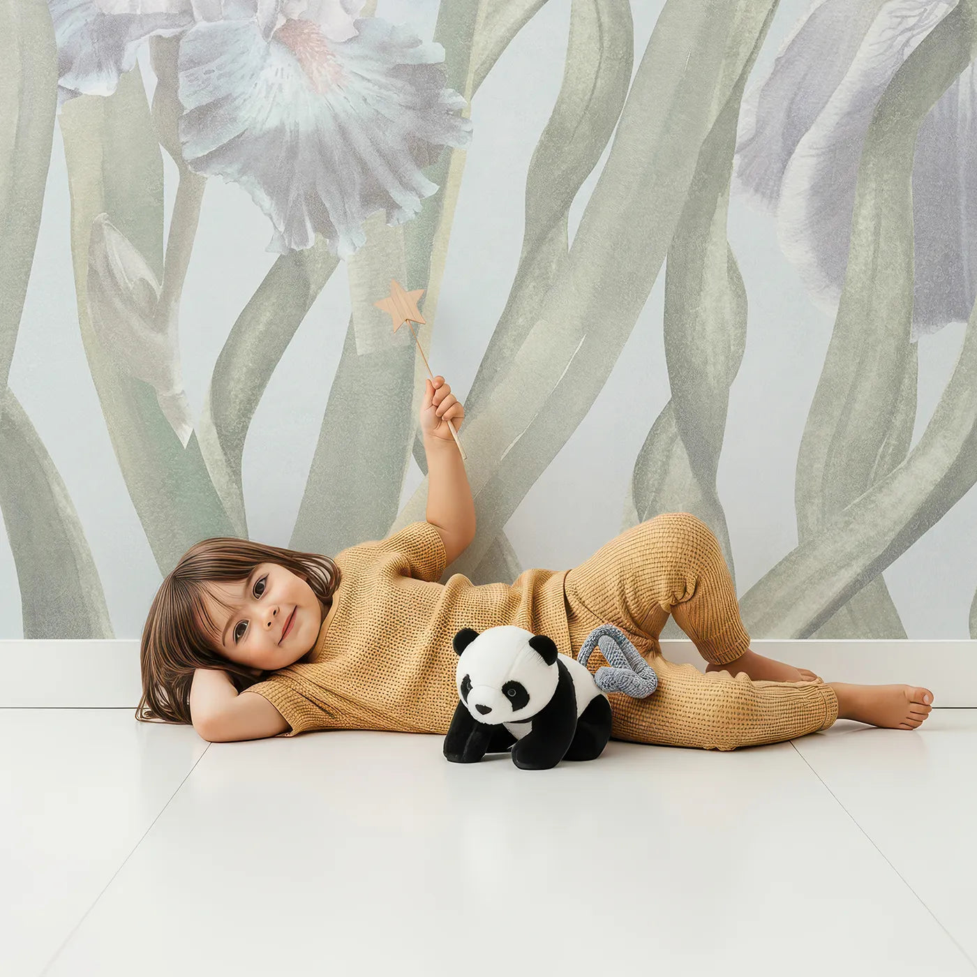 Child in front of Whimsy Tots Pastel Iris Garden Wall Mural with flower, iris, pastel, blue, painterly, impressionist, floral, garden in design.