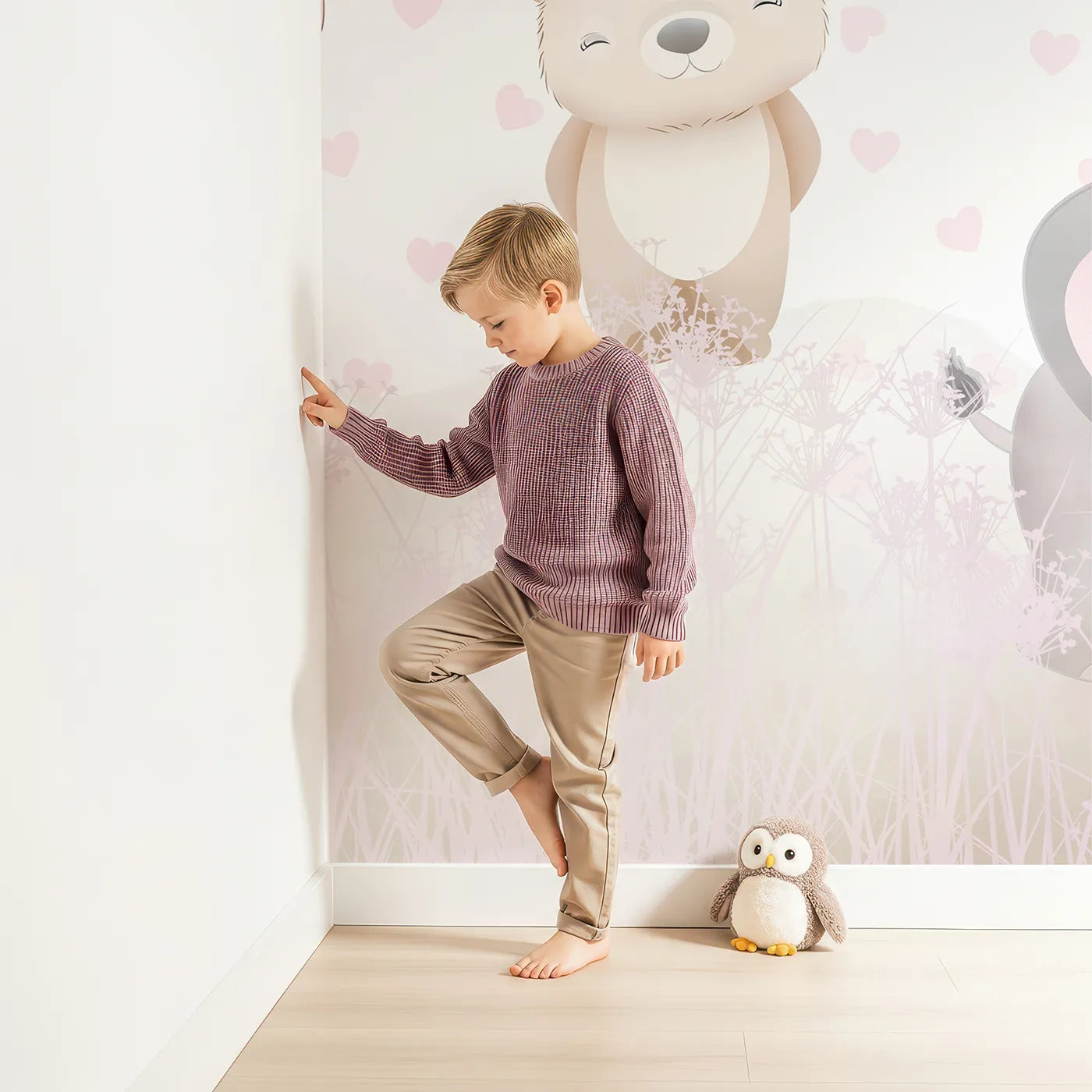 Child in front of Whimsy Tots Pastel Safari Hearts Wall Mural with animal, safari, cute, pink, heart, giraffe, elephant, panda in design.