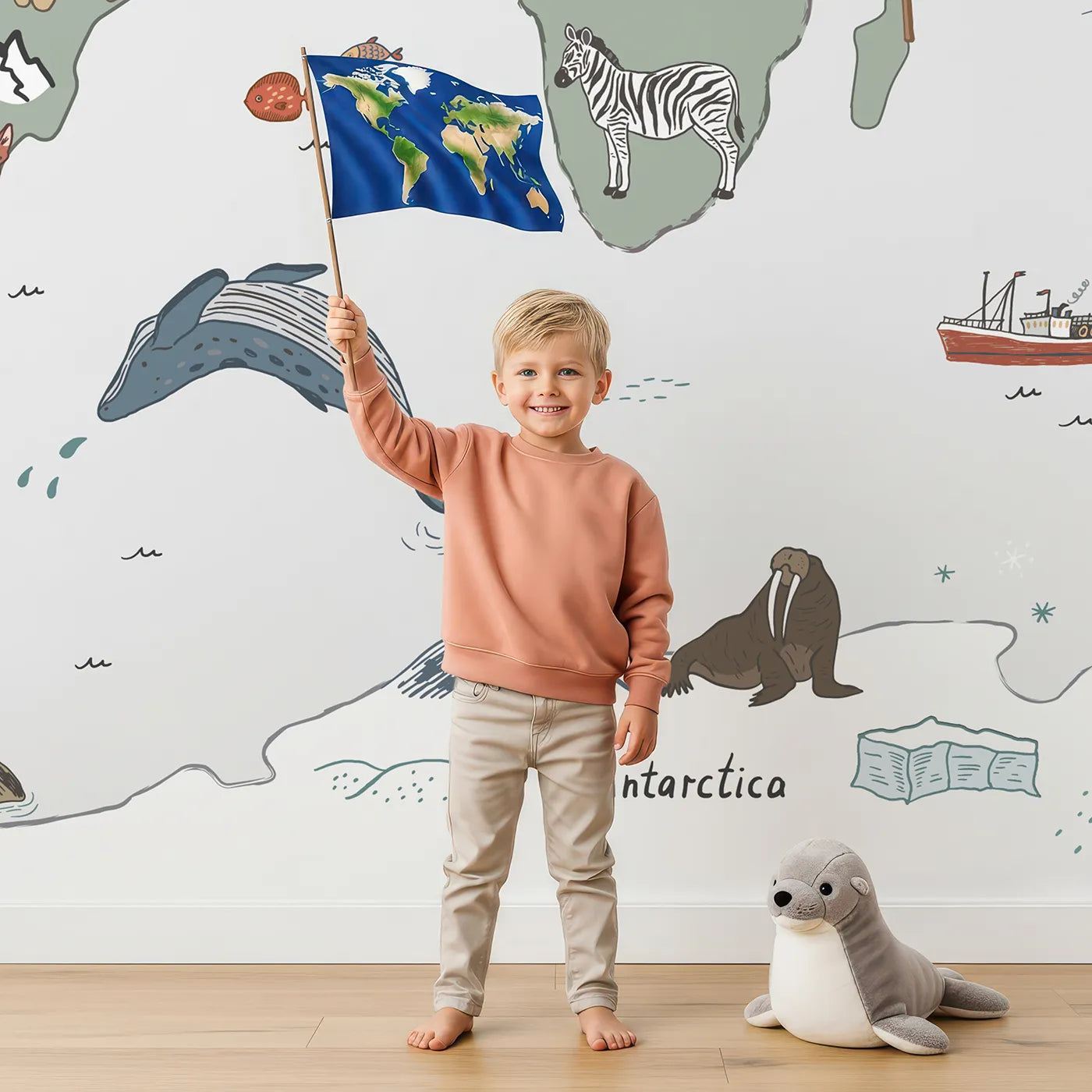 Child in front of Whimsy Tots Doodle Animal World Map Wall Mural with map, world, animal, doodle, drawing, educational, travel, cute in design.