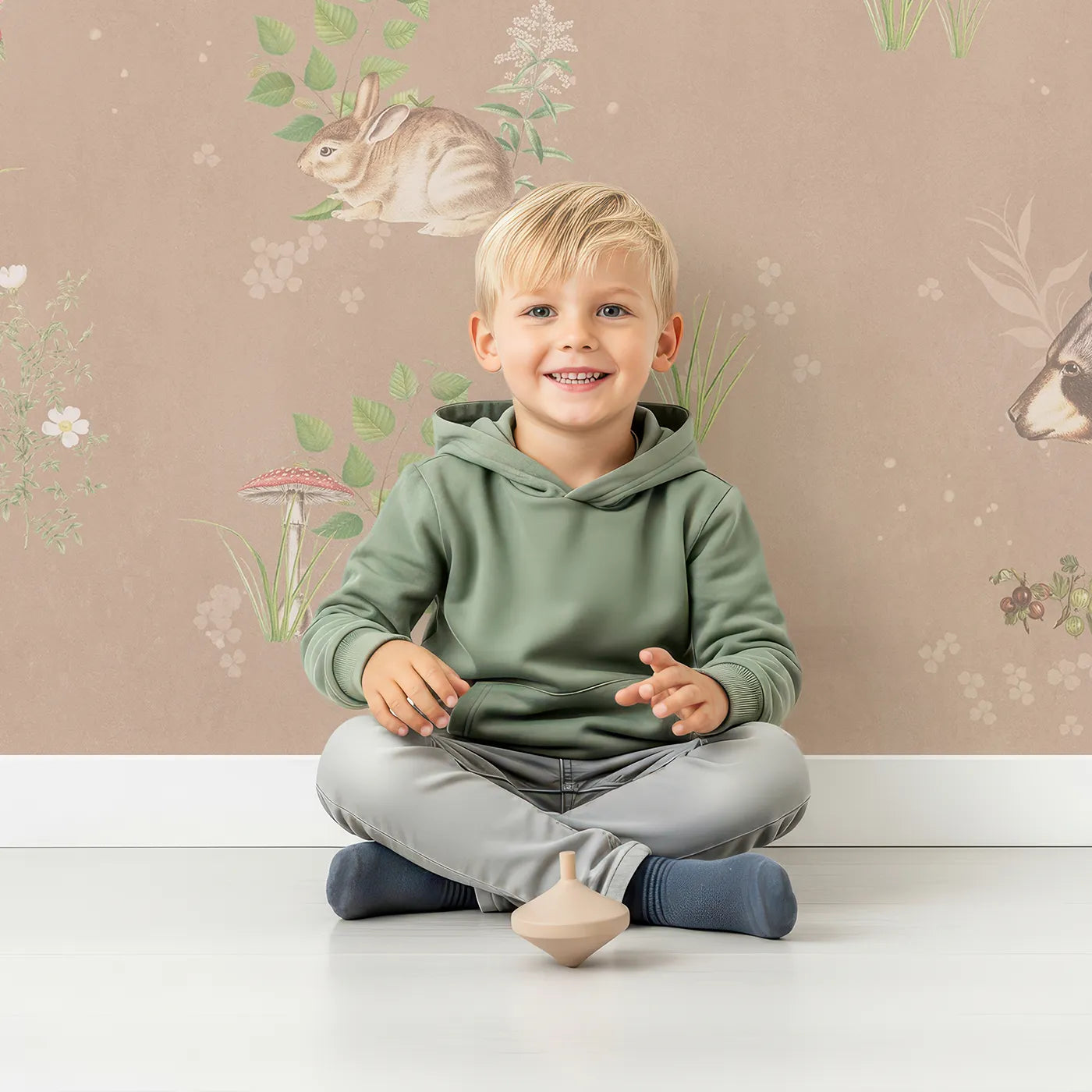 Child in front of Whimsy Tots Classic Woodland Friends Wall Mural with woodland, animal, vintage, realistic, forest, deer, bear, fox in design.