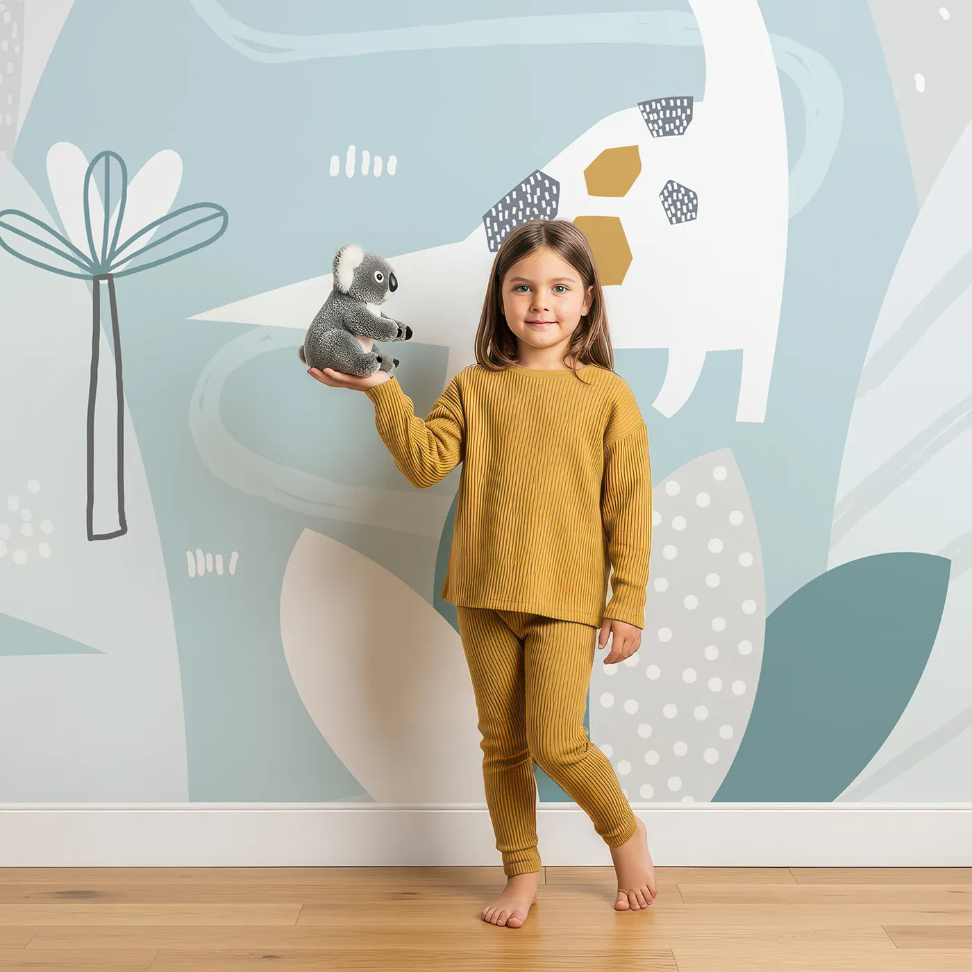 Child in front of Whimsy Tots Pastel Dinosaur Land Wall Mural with dinosaur, prehistoric, pastel, modern, volcano, minimalist, cute, blue in design.