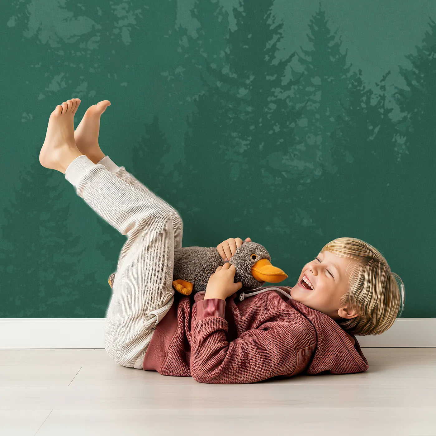 Child in front of Whimsy Tots Misty Green Mountain Forest Wall Mural with forest, mountain, mist, fog, tree, landscape, green, pine in design.
