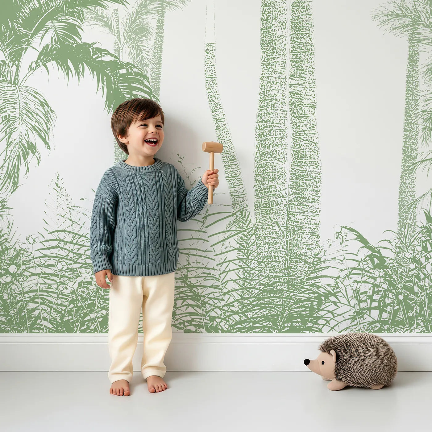 Child in front of Whimsy Tots Green Palm Engraving Wall Mural with palm tree, jungle, tropical, green, engraving, line art, vintage, modern in design.