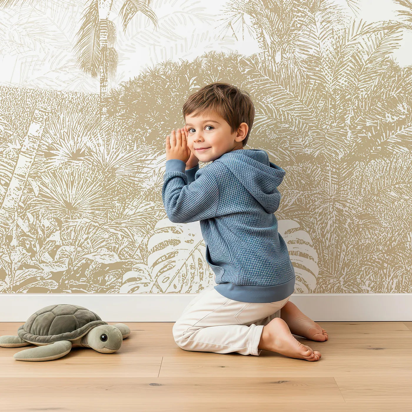 Child in front of Whimsy Tots Golden Jungle Line Art Wall Mural with jungle, tropical, line art, engraving, gold, beige, leaf, pattern in design.
