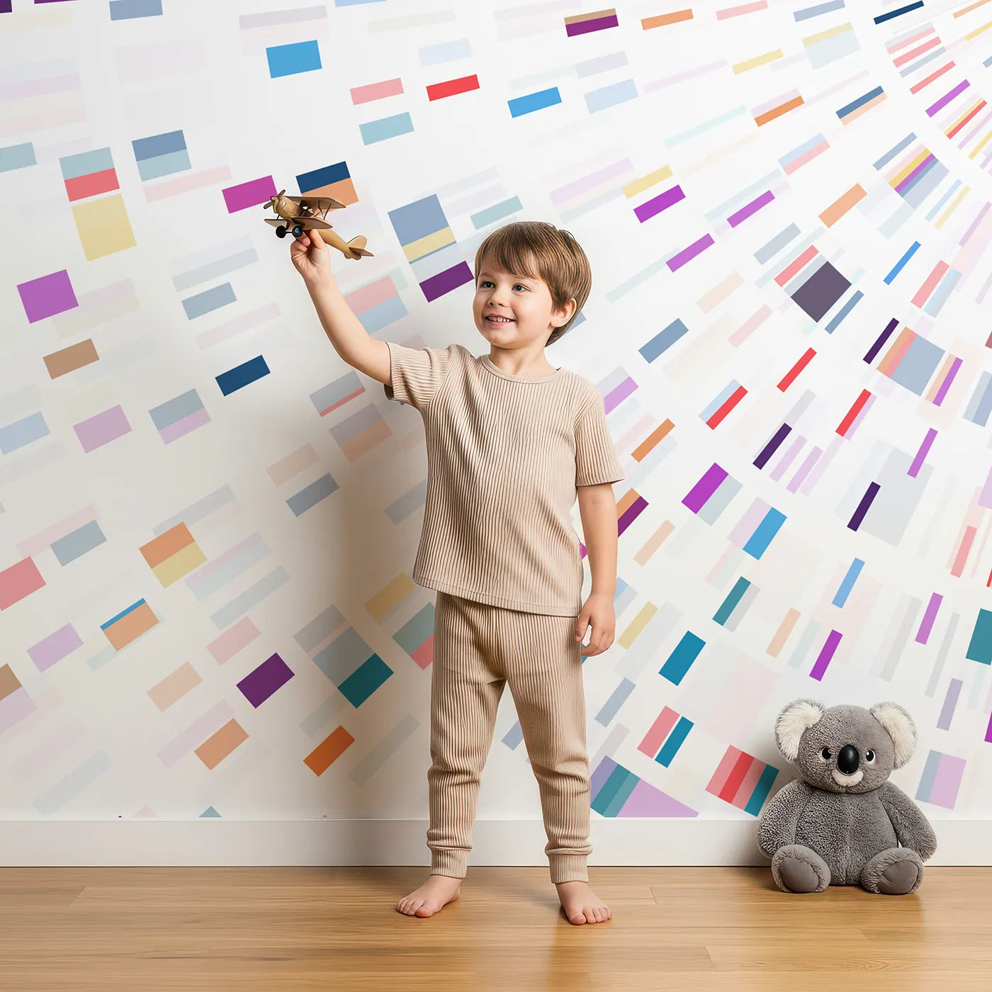Child in front of Whimsy Tots Data Stream Wall Mural with data, abstract, modern, colorful, geometric, tech, science, futuristic in design.