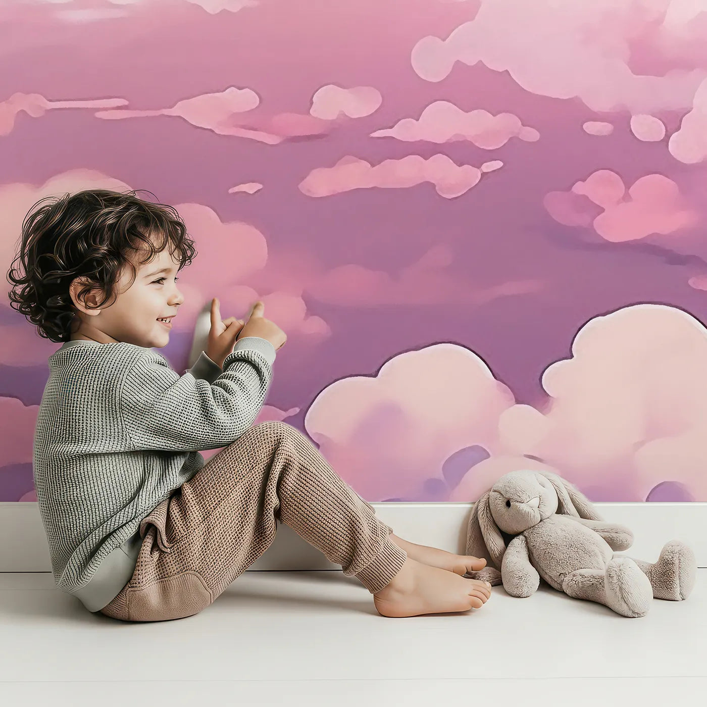 Child in front of Whimsy Tots Anime Sky High Wall Mural with sky, cloud, airplane, anime, pink, purple, painterly, dreamy in design.