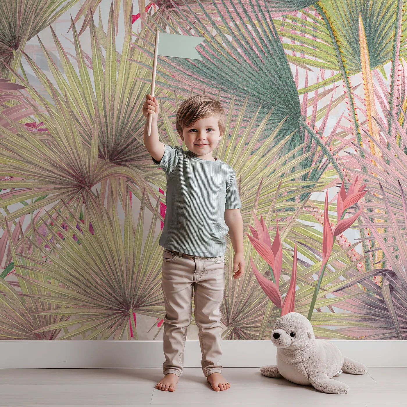 Child in front of Whimsy Tots Pastel Tropical Jungle Wall Mural with jungle, tropical, pastel, colorful, leaf, flower, vibrant, pink in design.
