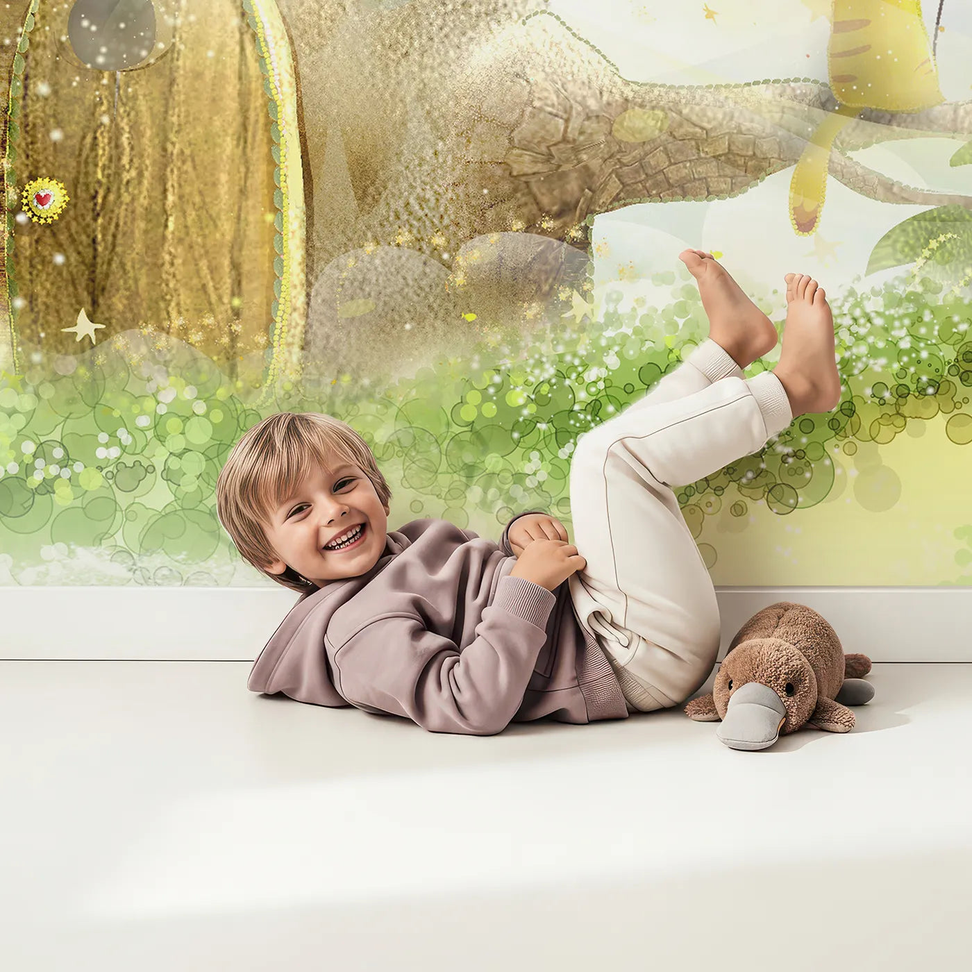 Child in front of Whimsy Tots Magical Treehouse Home Wall Mural with fairytale, fantasy, magic, treehouse, village, sparkle, green, whimsical in design.