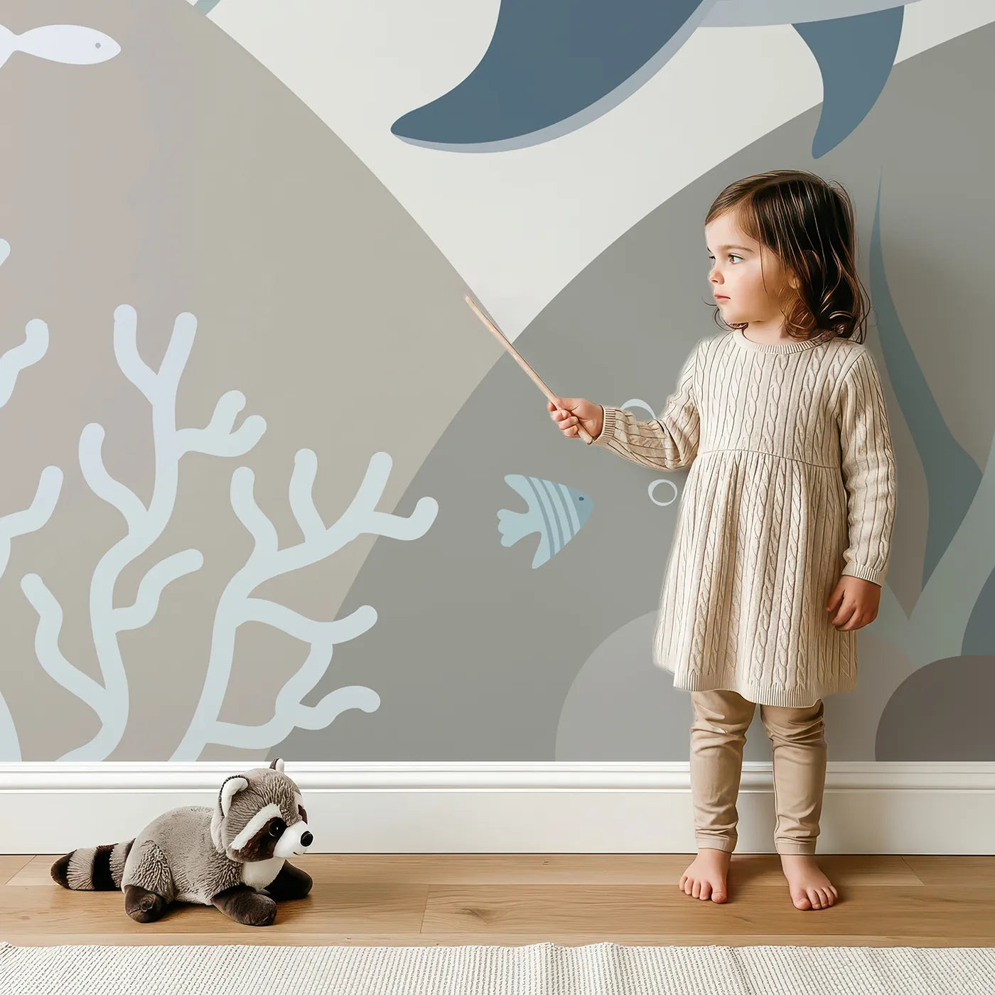 Child in front of Whimsy Tots Neutral Tone Whale and Coral Wall Mural with whale, ocean, sea, abstract, minimalist, blue, beige, underwater in design.