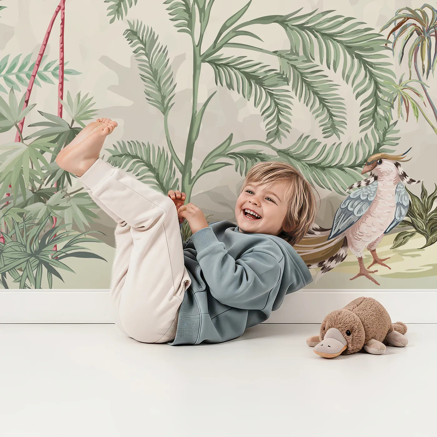 Child in front of Whimsy Tots Exotic Bird Paradise Wall Mural with chinoiserie, vintage, floral, bird, exotic, tropical, classic, elegant in design.