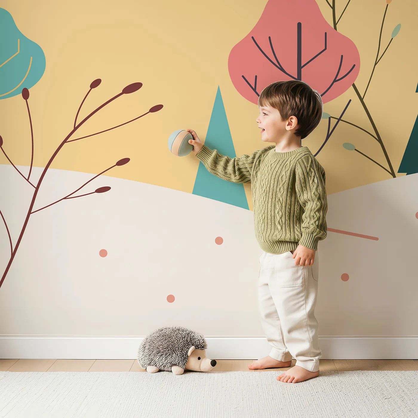 Child in front of Whimsy Tots Minimalist Autumn Forest Wall Mural with autumn, forest, minimalist, modern, pink, orange, landscape, tree in design.