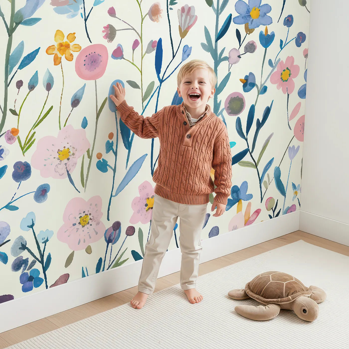 Child in front of Whimsy Tots Pressed Wildflower Wall Mural with flower, wildflower, watercolor, floral, pattern, colorful, pastel, botanical in design.