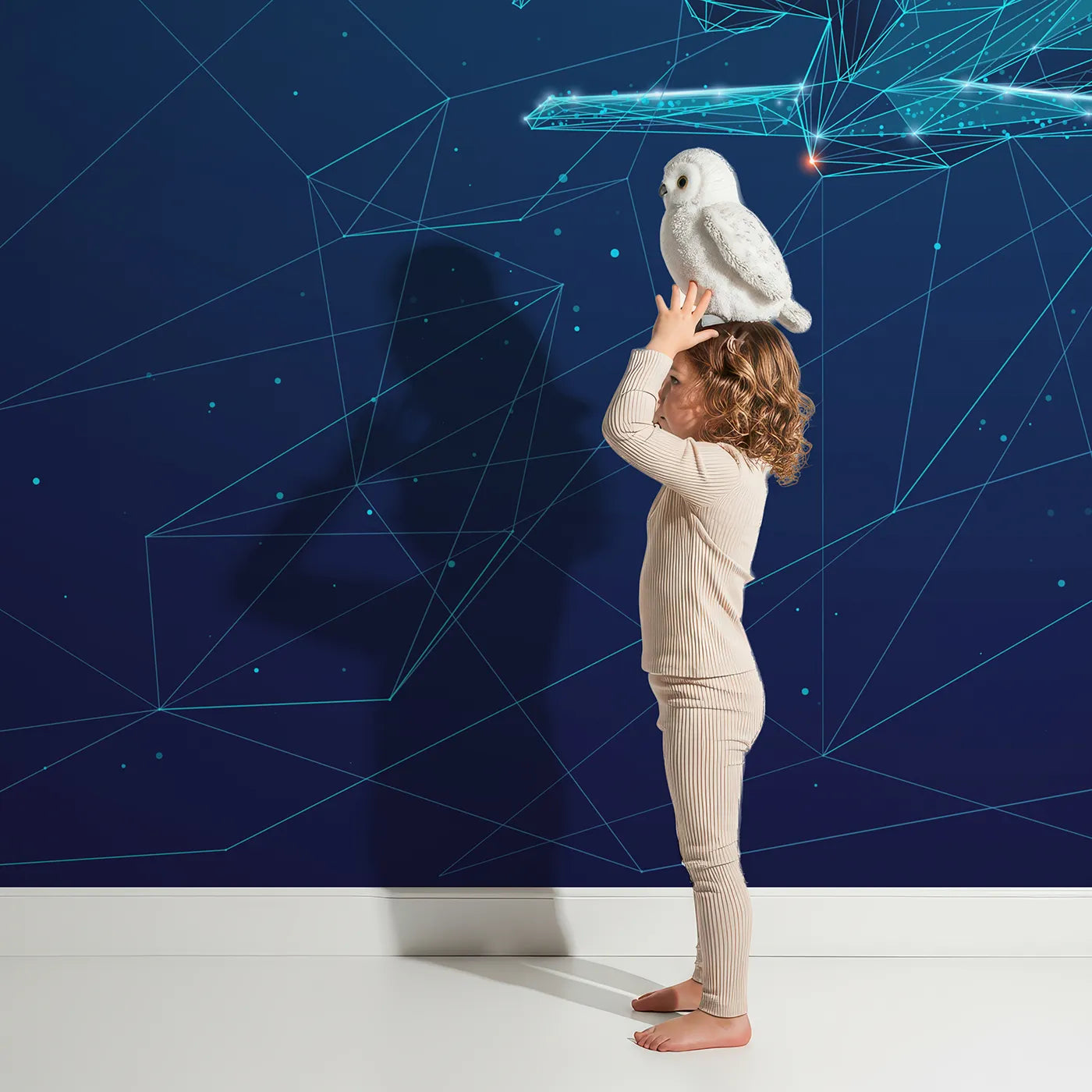 Child in front of Whimsy Tots Digital Airplane Wall Mural with airplane, digital, wireframe, tech, science, blue, futuristic, modern in design.