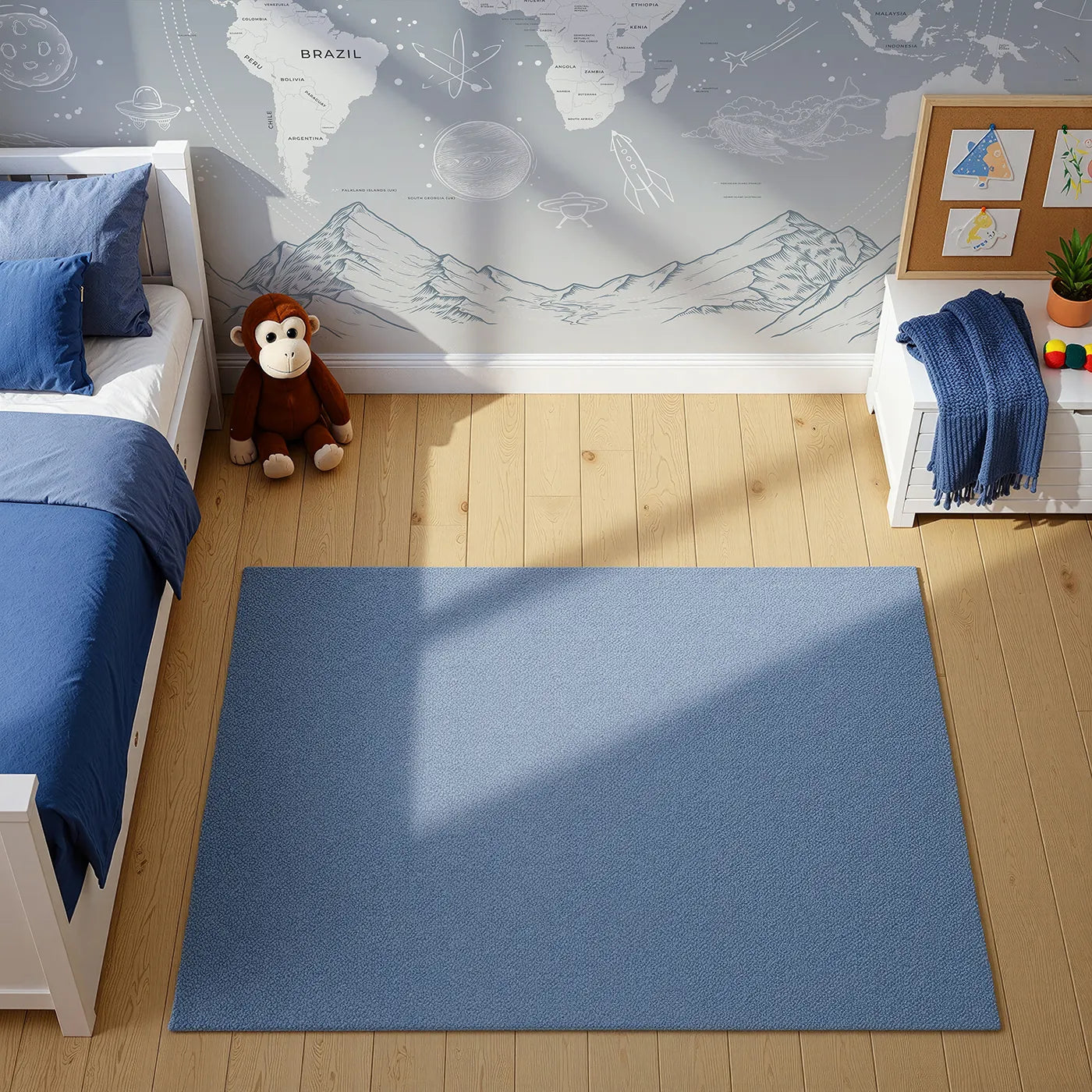 Top-down view of Whimsy Tots' Cosmic Explorer World Map Wall Mural in Blue (Turn Their Room into a Cosmic Global Adventure).Gender-Neutral