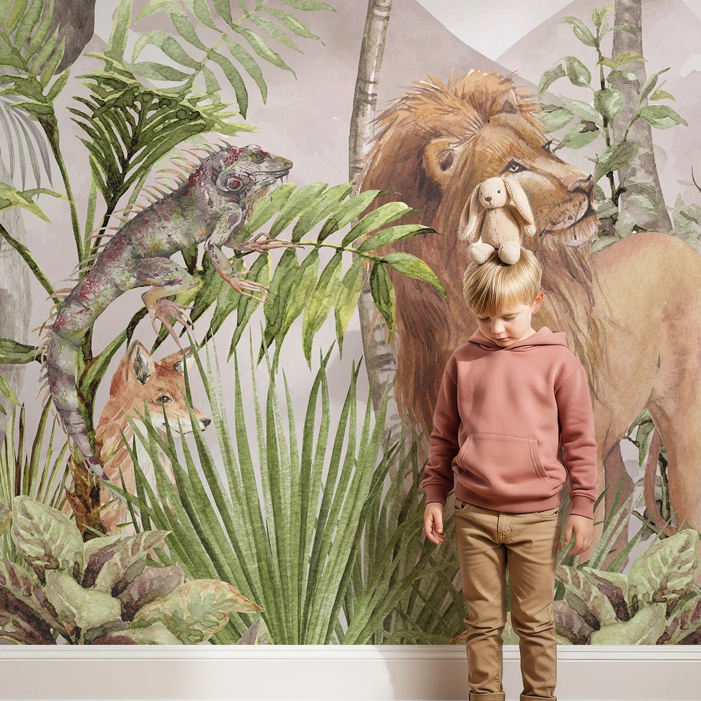 Child in front of Whimsy Tots Watercolor Safari Wall Mural in Pink with safari, animal, jungle, watercolor, elephant, lion, giraffe, pink in design.