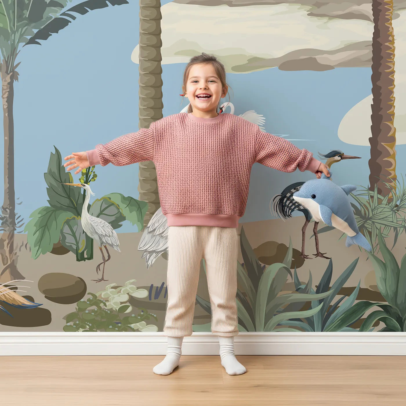 Child in front of Whimsy Tots Exotic Bird Oasis Wall Mural with chinoiserie, vintage, bird, exotic, tropical, classic, oasis, palm tree in design.