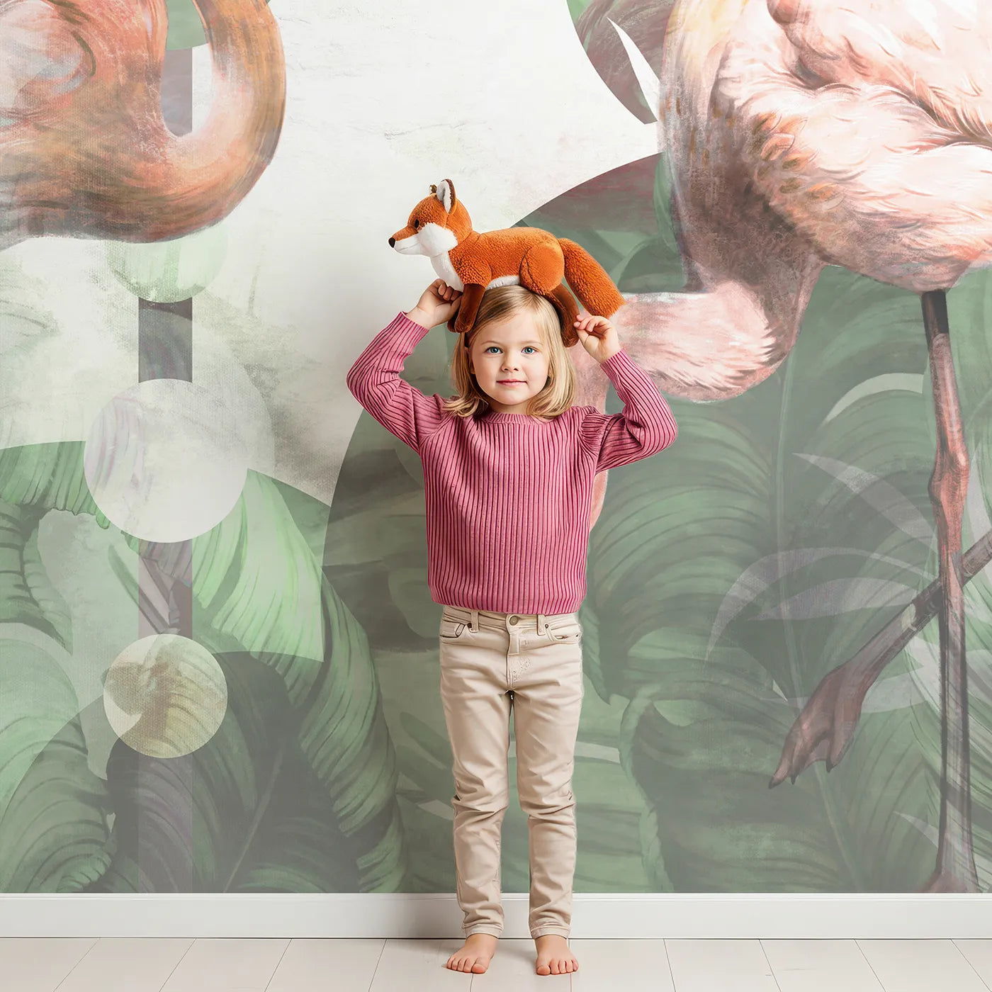 Child in front of Whimsy Tots Abstract Flamingo Wall Mural with flamingo, abstract, tropical, leaf, modern, green, circle, geometric in design.