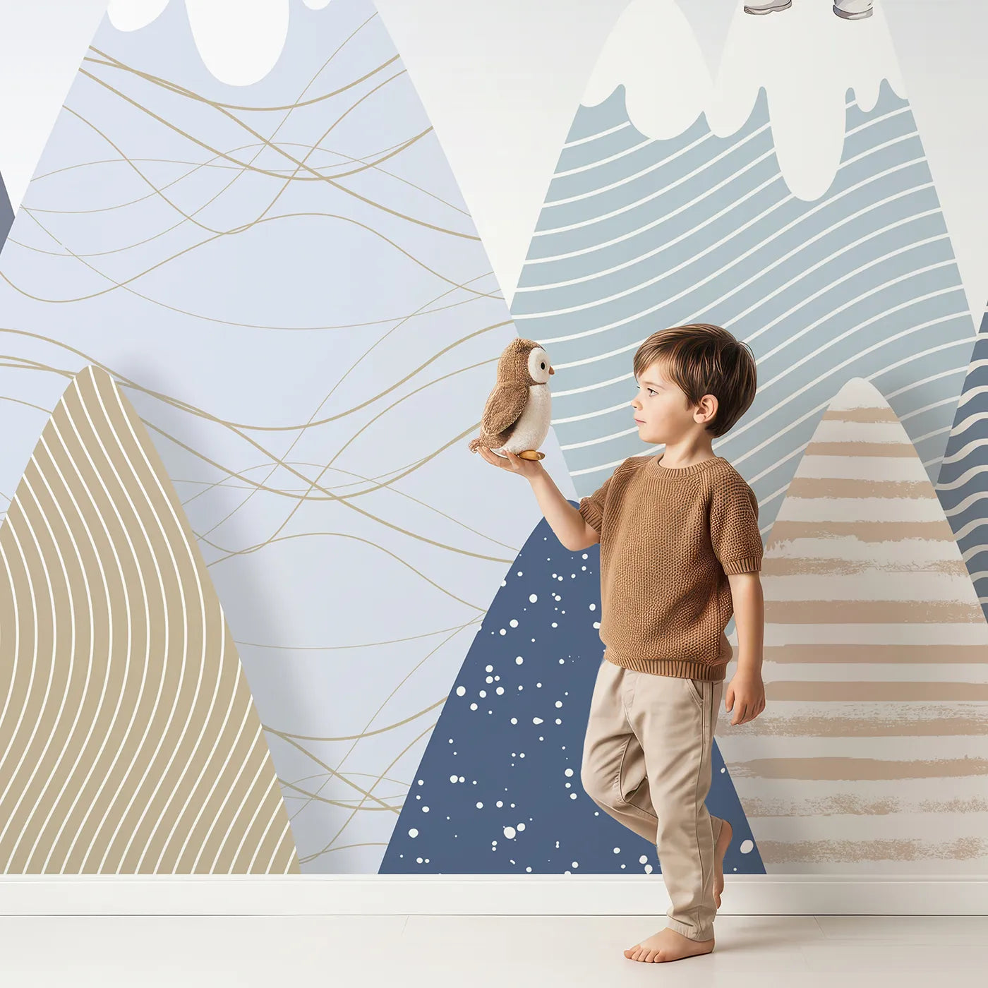 Child in front of Whimsy Tots Astronaut Mountain Toppers Wall Mural with astronaut, mountain, space, rocket, cute, modern, minimalist, pattern in design.