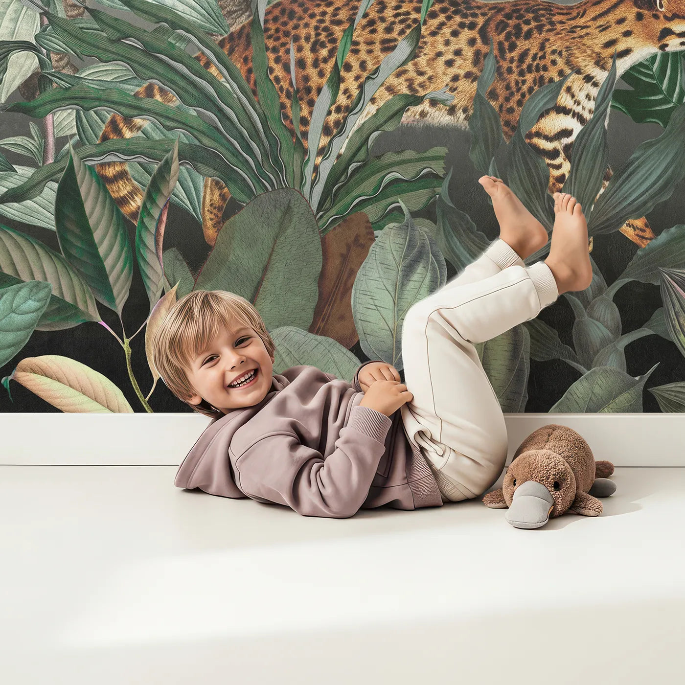 Child in front of Whimsy Tots Vintage Jungle Safari Wall Mural with safari, jungle, vintage, animal, elephant, giraffe, leopard, realistic in design.